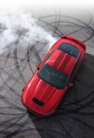 Overhead view of a 2024 Ford Mustang® model with tire tracks on pavement | Five Star Ford in Aberdeen WA
